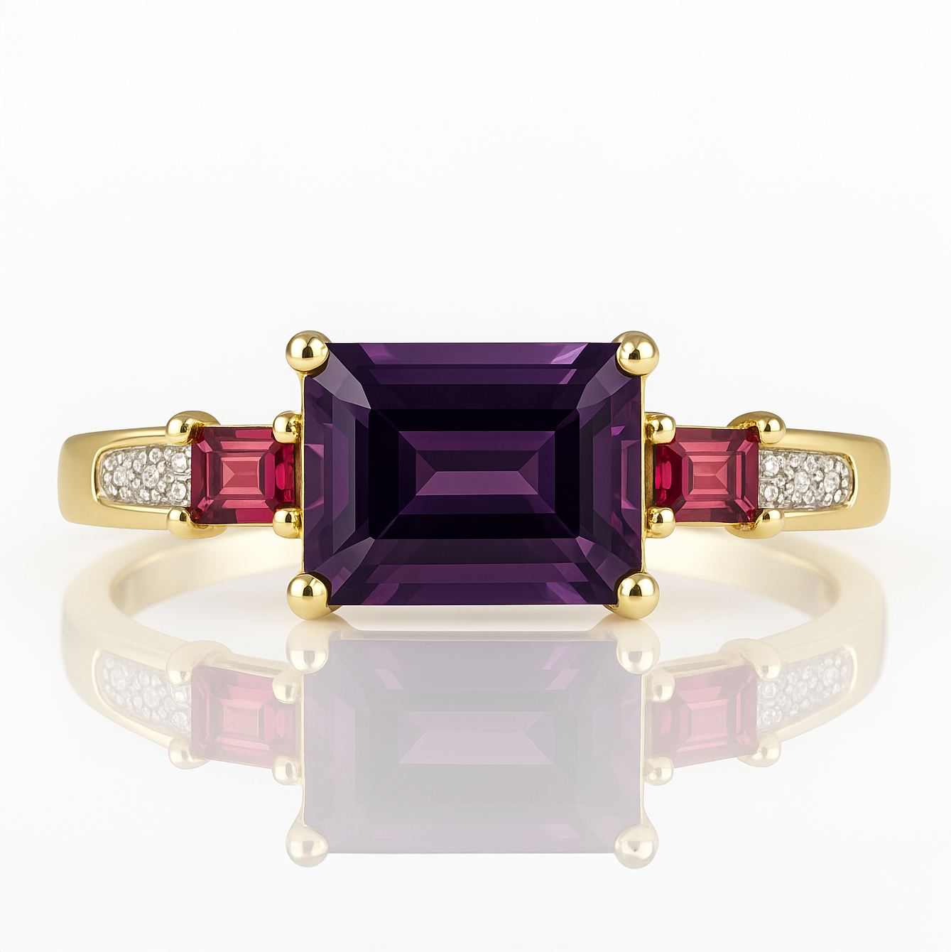 Gold ring with a purple gemstone and pink accents on a white background