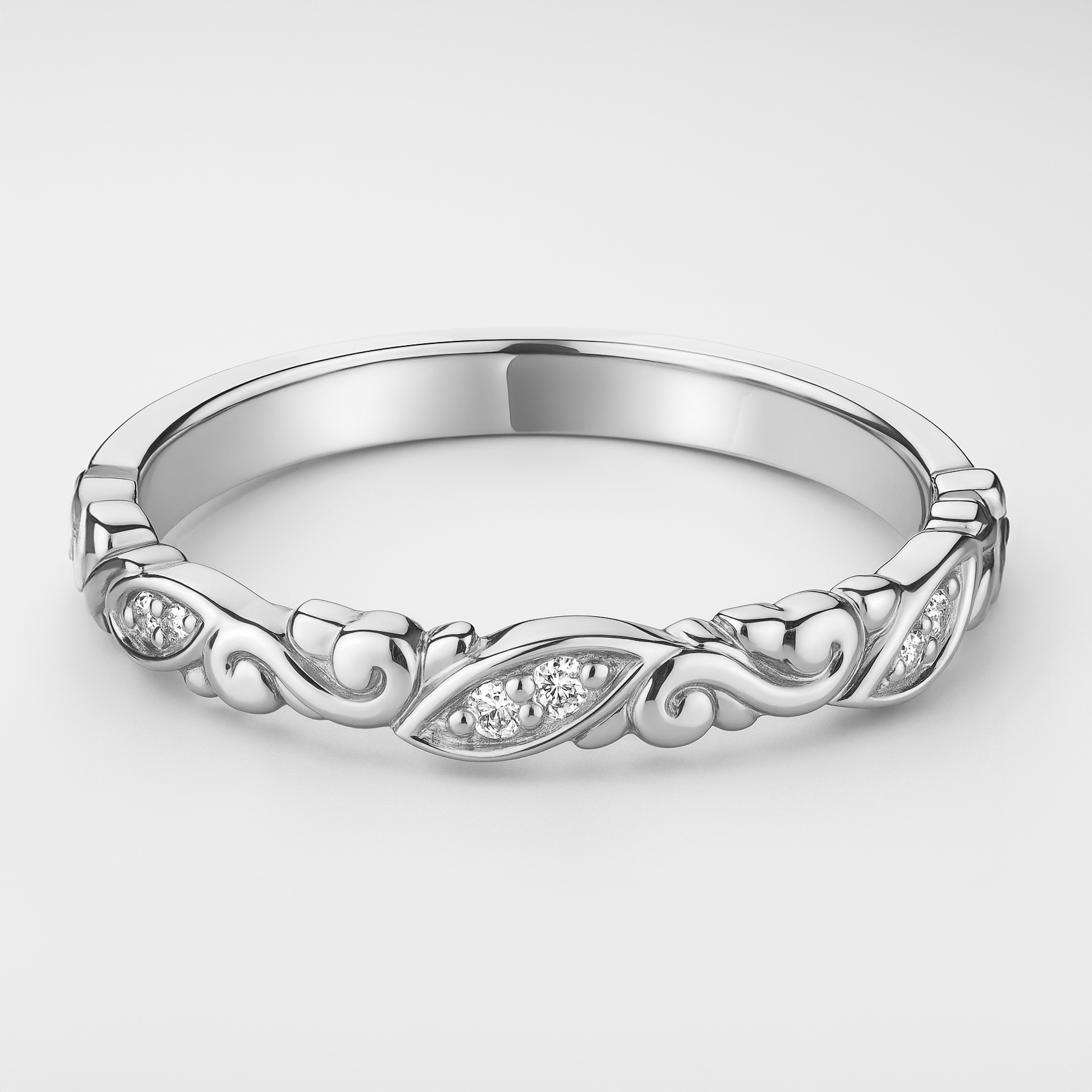 Platinum Scroll Detail Wedding Ring on a White Backround