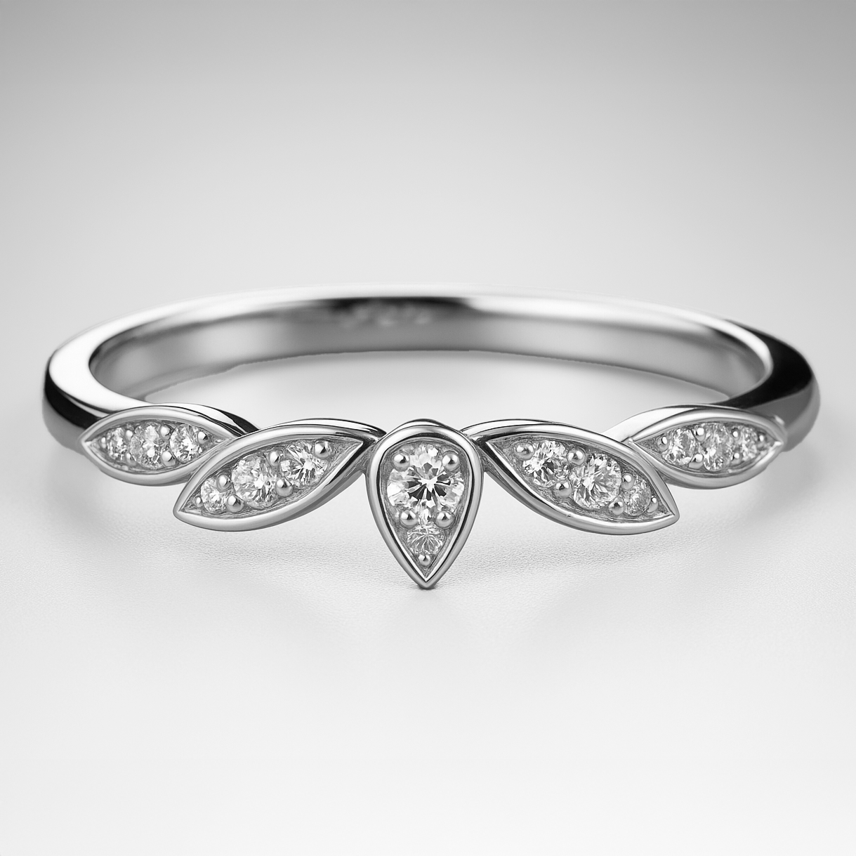 Platinum Floral Wedding Ring with Diamond Accents on a grey background