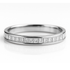 Platinum ring with diamond accents on a white background