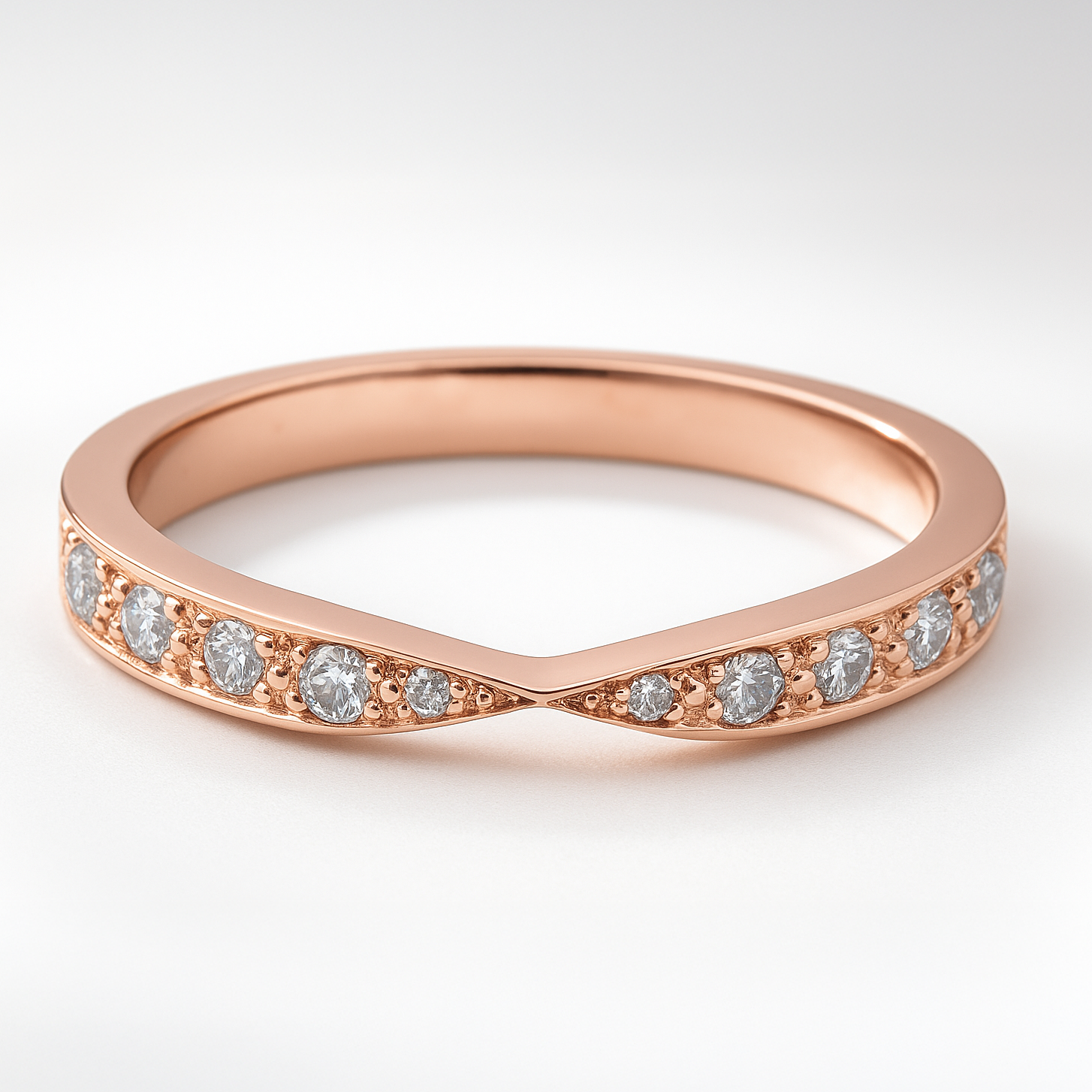 Rose Gold Twist Diamond Wedding Ring on a White Background