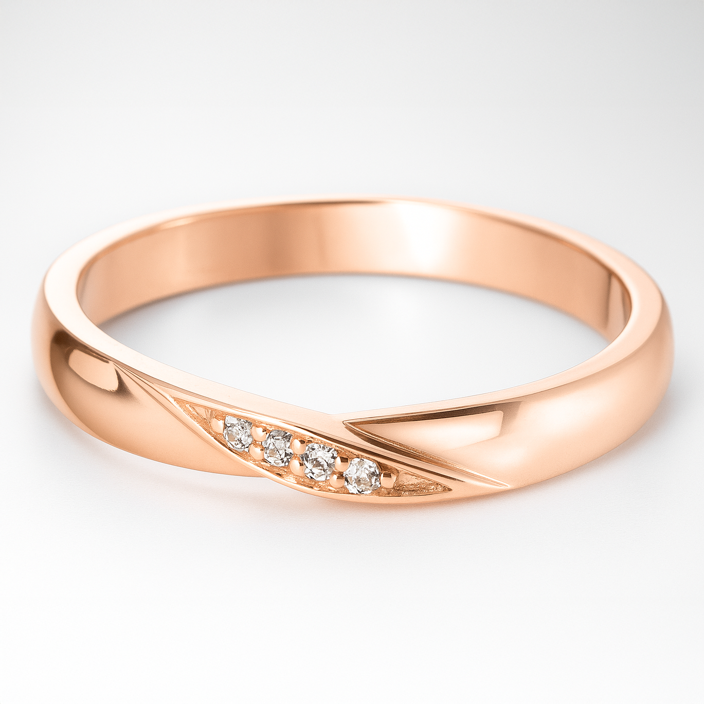 Rose Gold Wedding Ring with Diamond Accents on a White Background