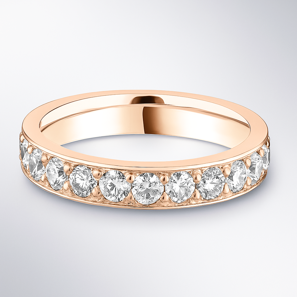 Rose gold ring with diamonds on a light grey background