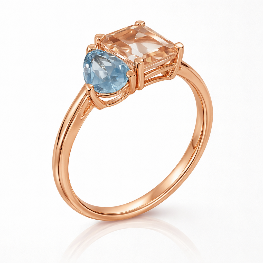 Rose gold ring with a blue gemstone on a white background