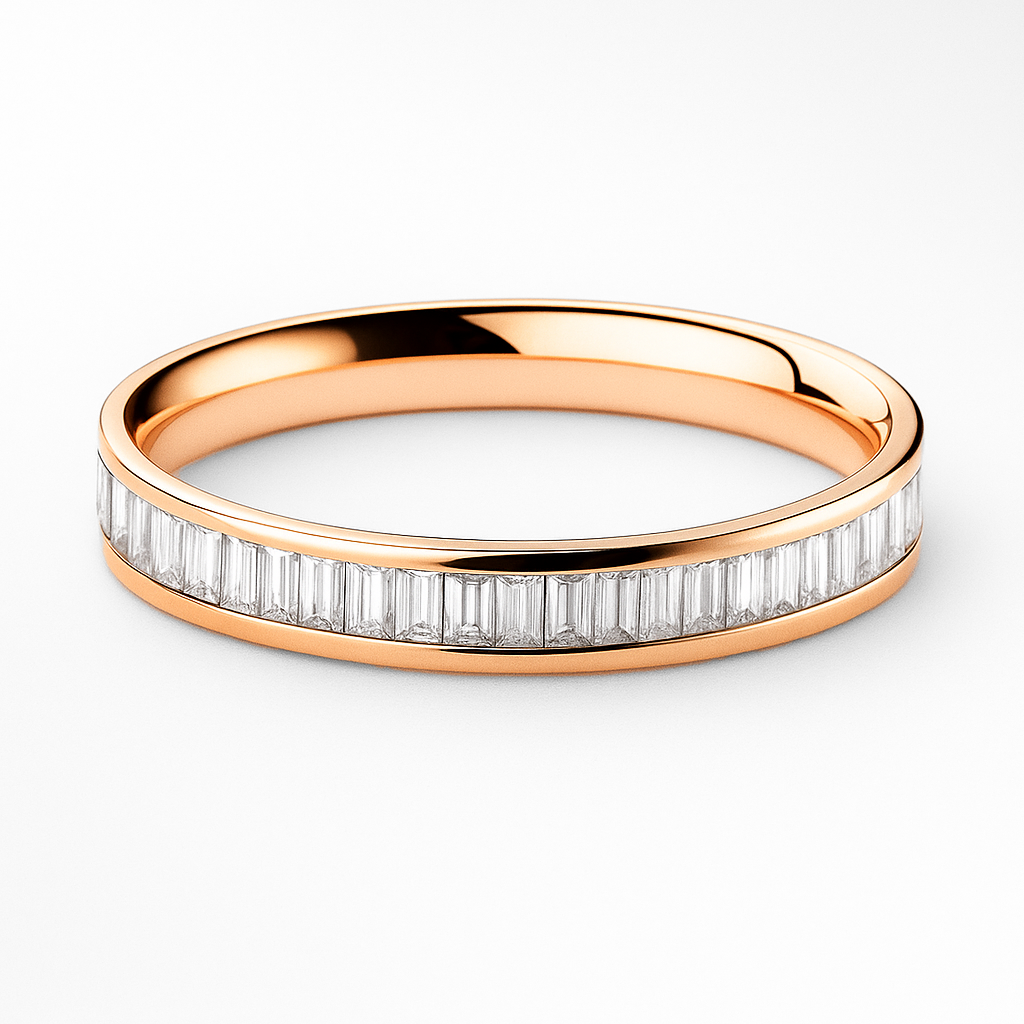 Rose gold ring with baguette diamonds on a white background