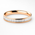 Rose gold ring with baguette diamonds on a white background