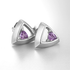 Pair of silver earrings with purple gemstones on a white background