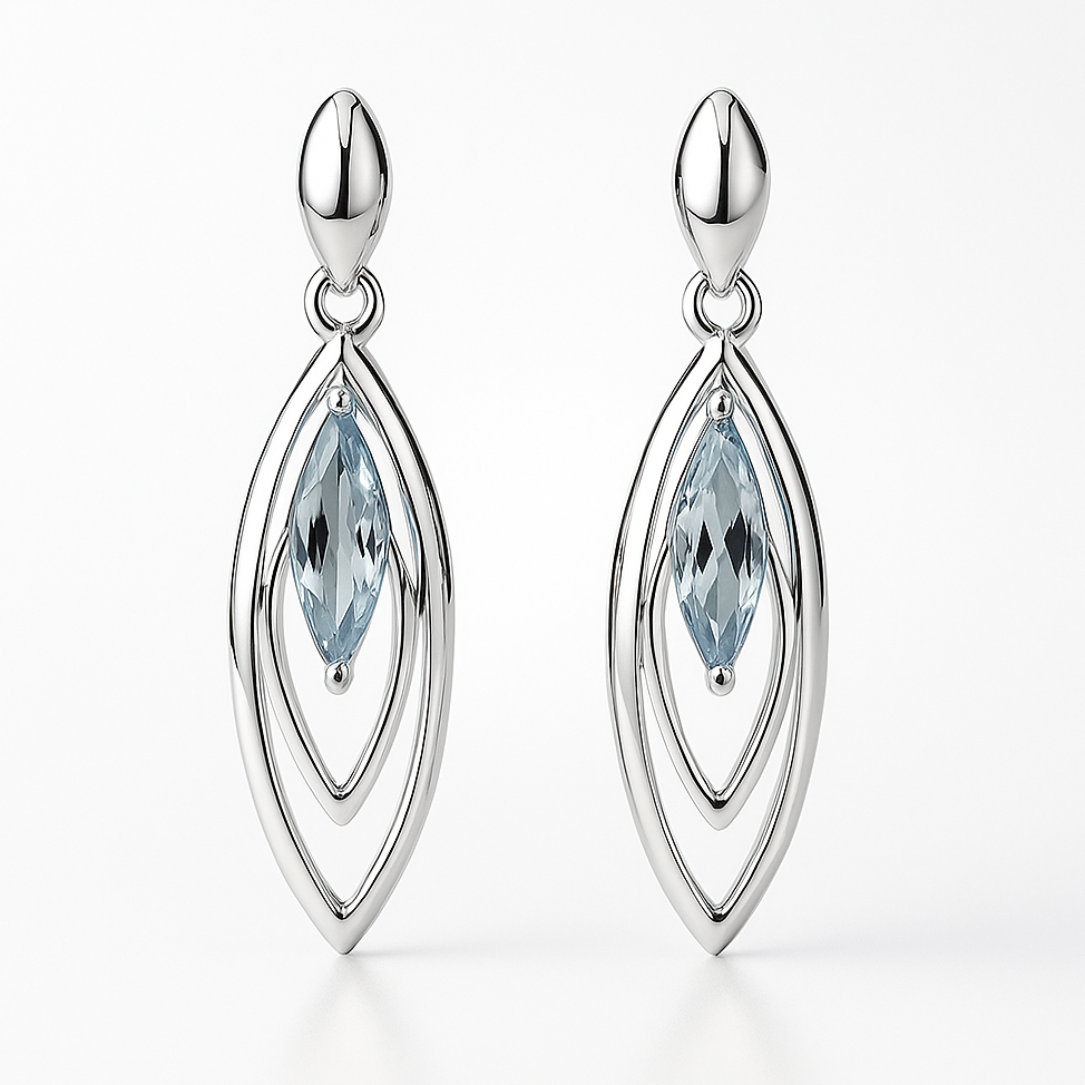 Silver earrings with blue gemstones on a white background