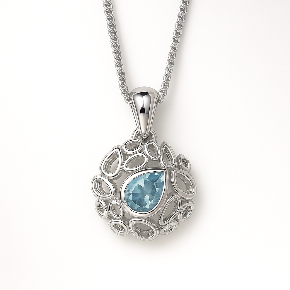 Silver pendant with a blue gemstone on a white background