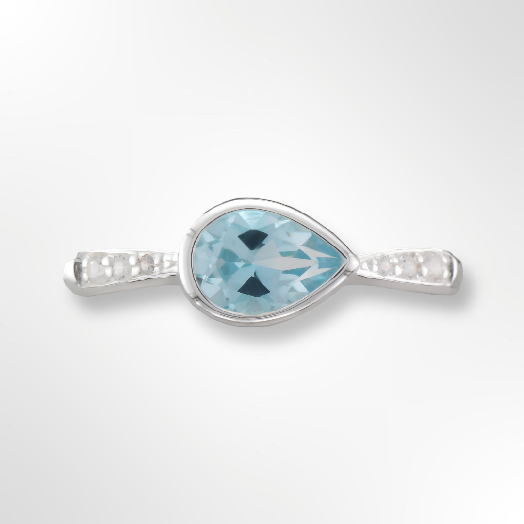 Silver Pear Shaped Blue Topaz and CZ Ring