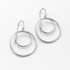 Pair of silver hoop earrings on a white background