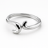 Silver ring with a unique design on a white background