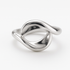 Silver ring with a modern design on a white background