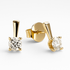 Gold stud earrings with clear gemstones on a white background