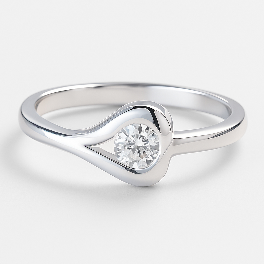 Silver ring with a clear  stone on a light grey background