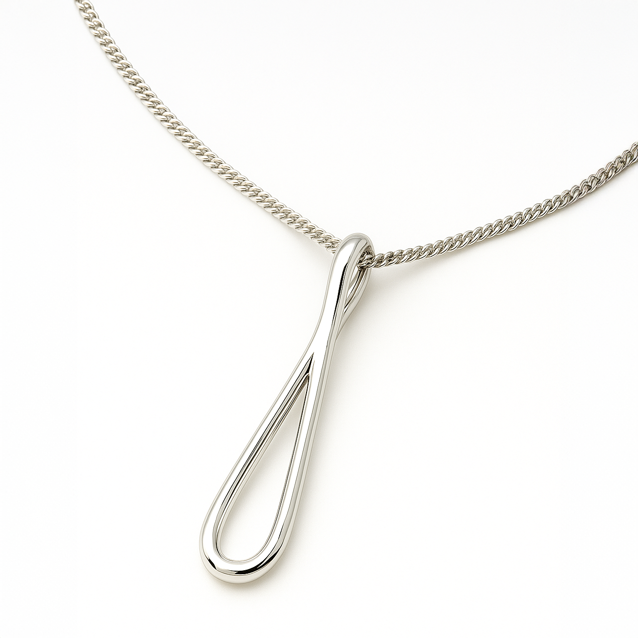 Silver necklace with a teardrop pendant on a white background