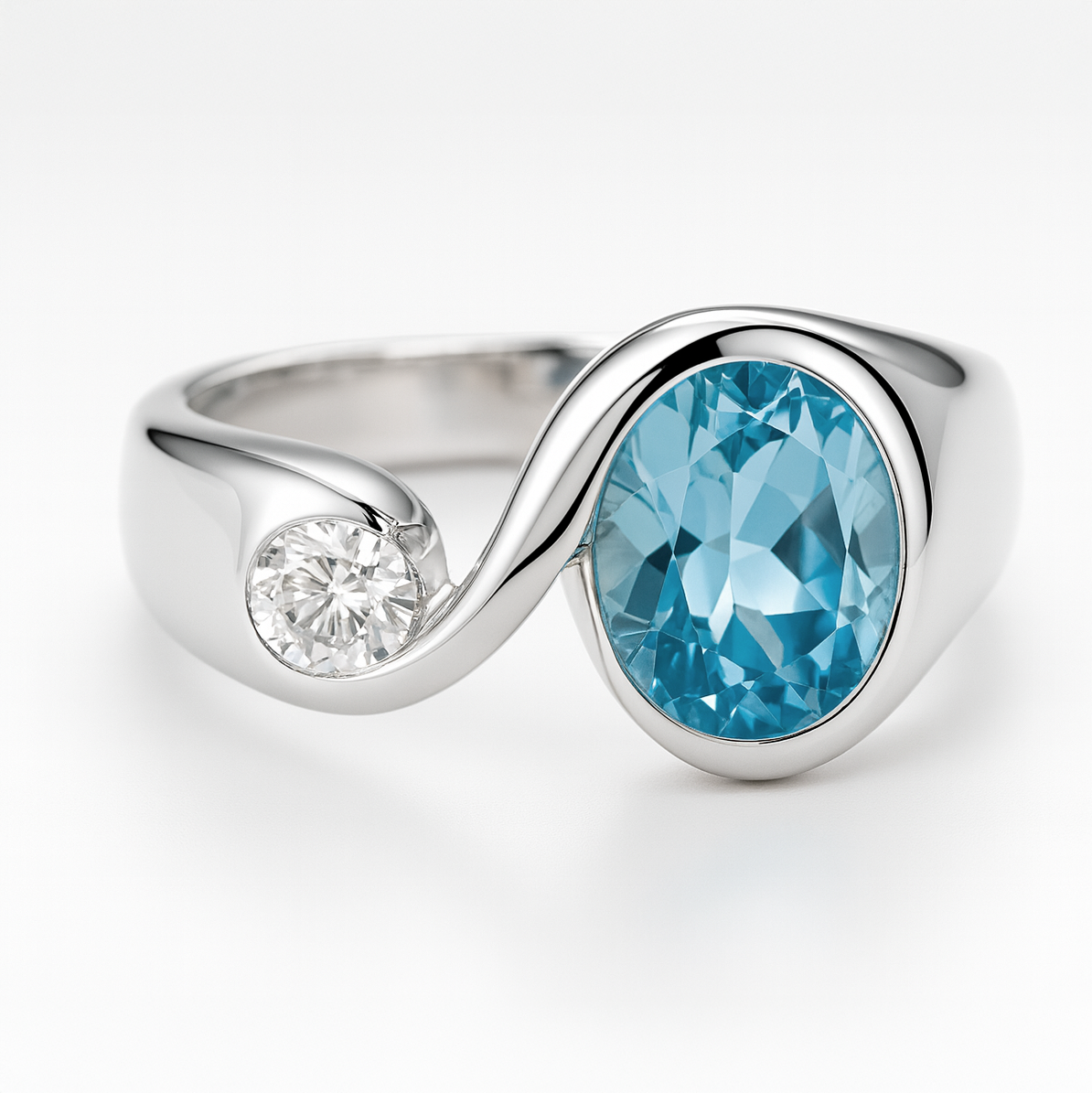 Silver ring with a blue gemstone and a white gemstone on a white background