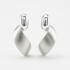 Pair of silver earrings on a white background