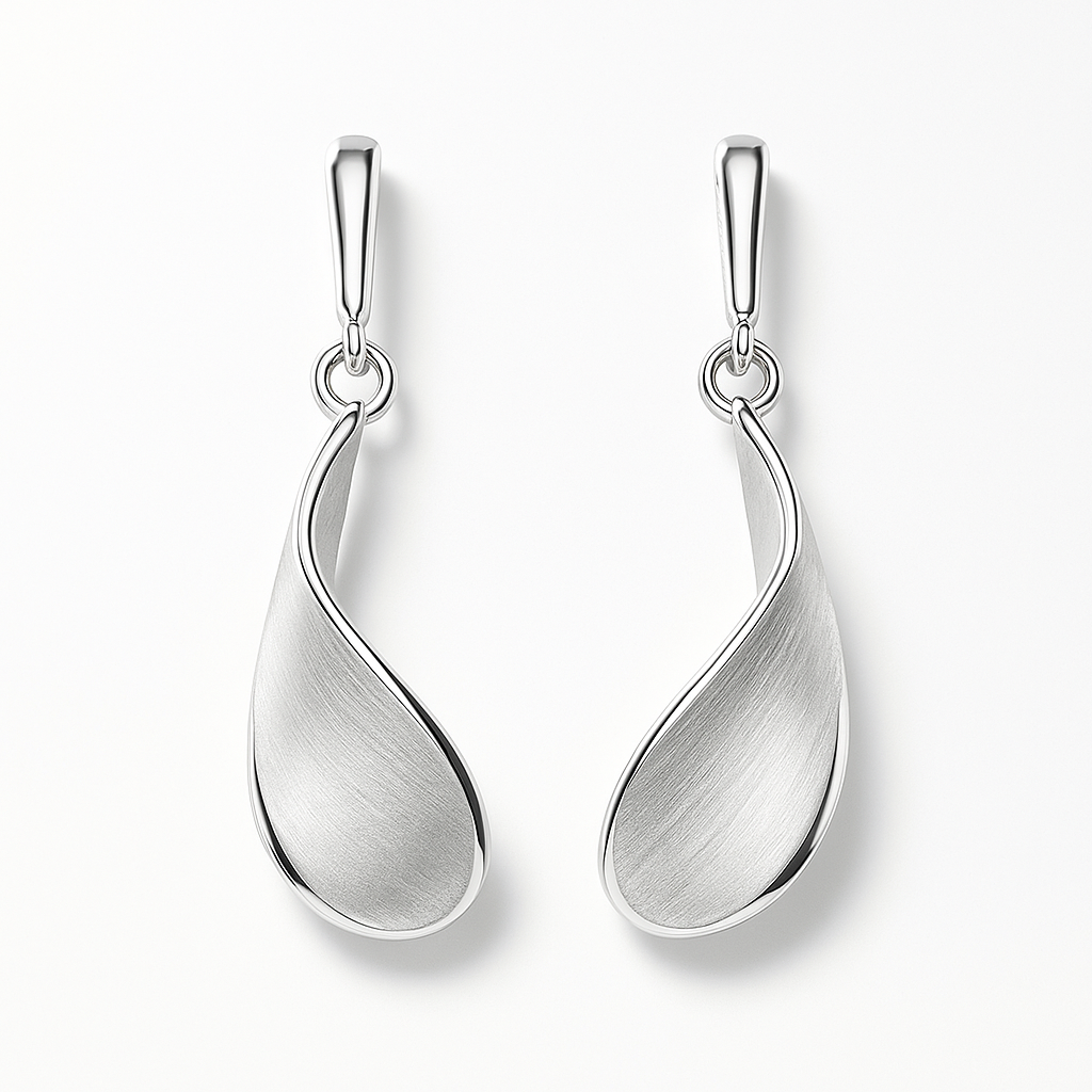 Pair of silver earrings on a white background