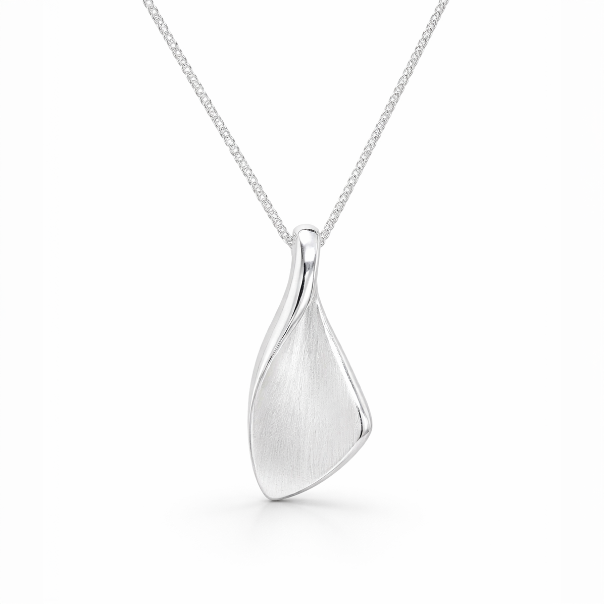 Silver teardrop pendant on a chain against a white background