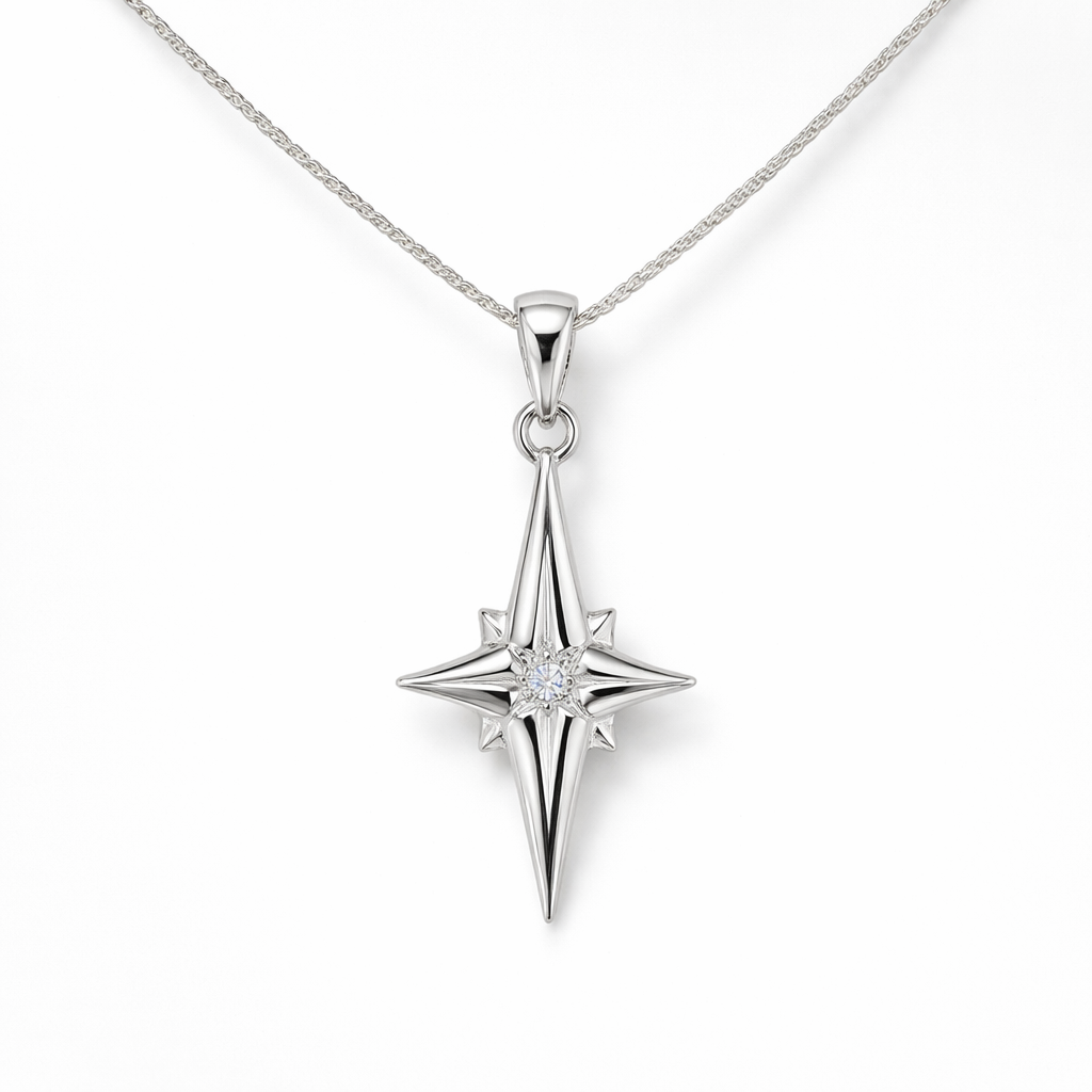 Silver star-shaped pendant on a white background