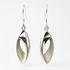 Pair of silver earrings on a white background