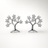 Silver tree-shaped earrings with cubic zirconia stones on a white background