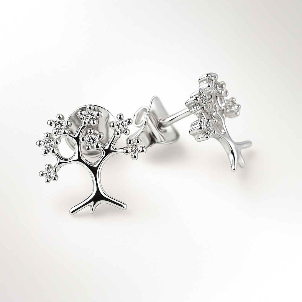 Silver tree-shaped earrings on a white background