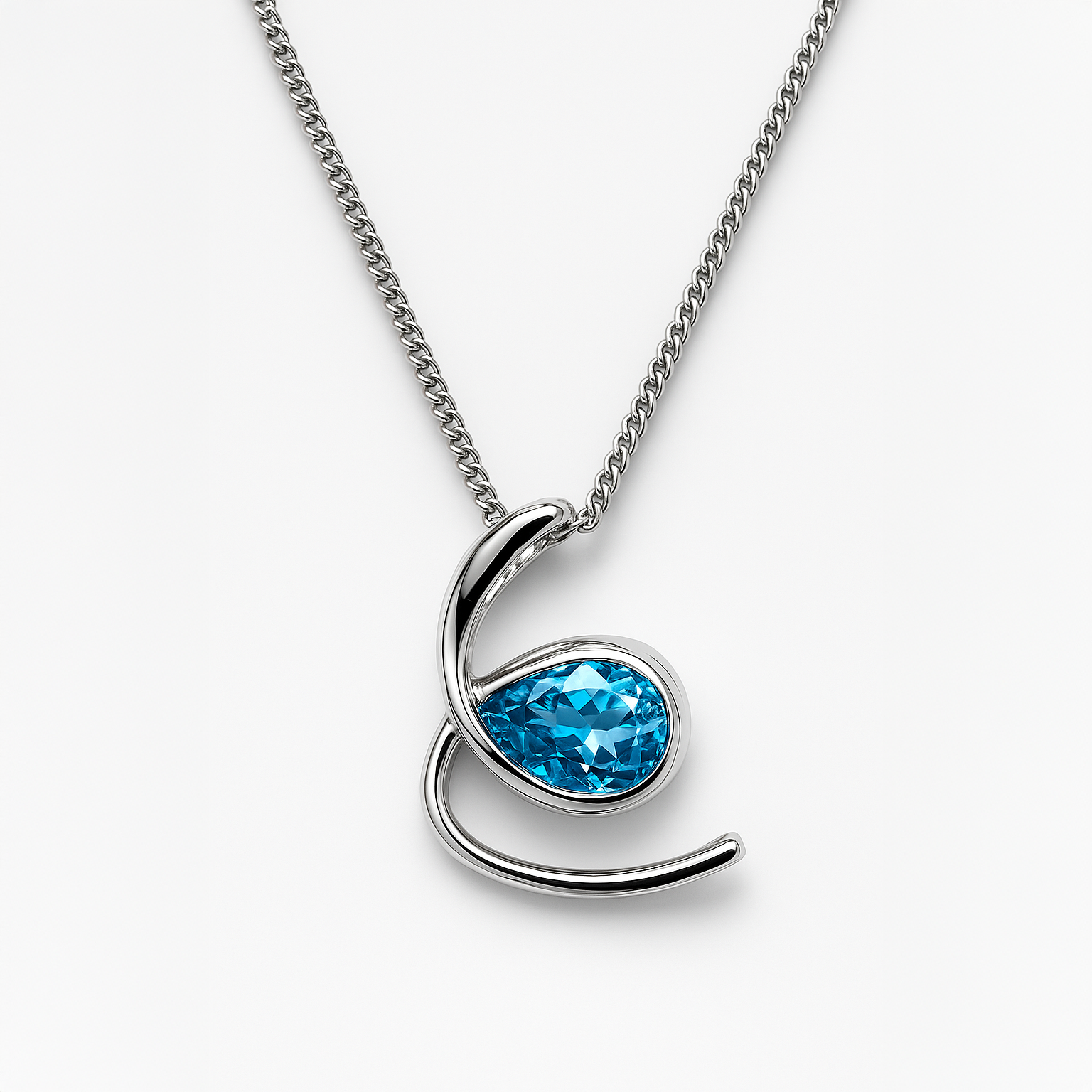 Silver necklace with a blue gemstone pendant on a white background