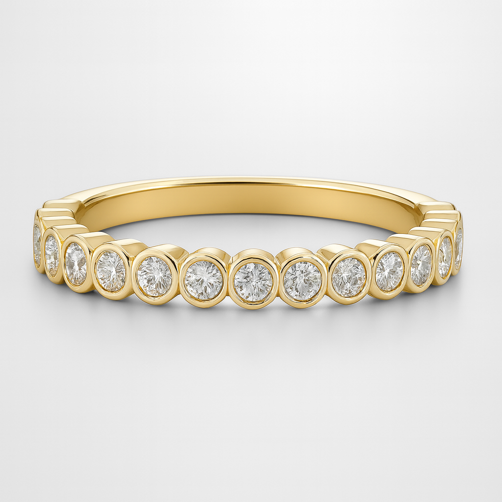 Gold Diamond Wedding ring with embedded diamonds on a light grey background