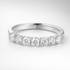 White gold wedding ring with diamonds on a white background