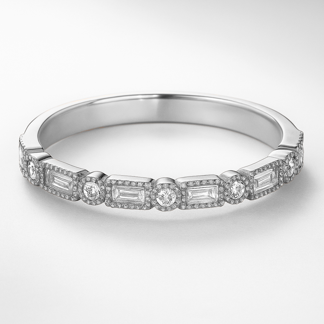 White Gold Diamond ring with baguette and round cut diamonds on a white background