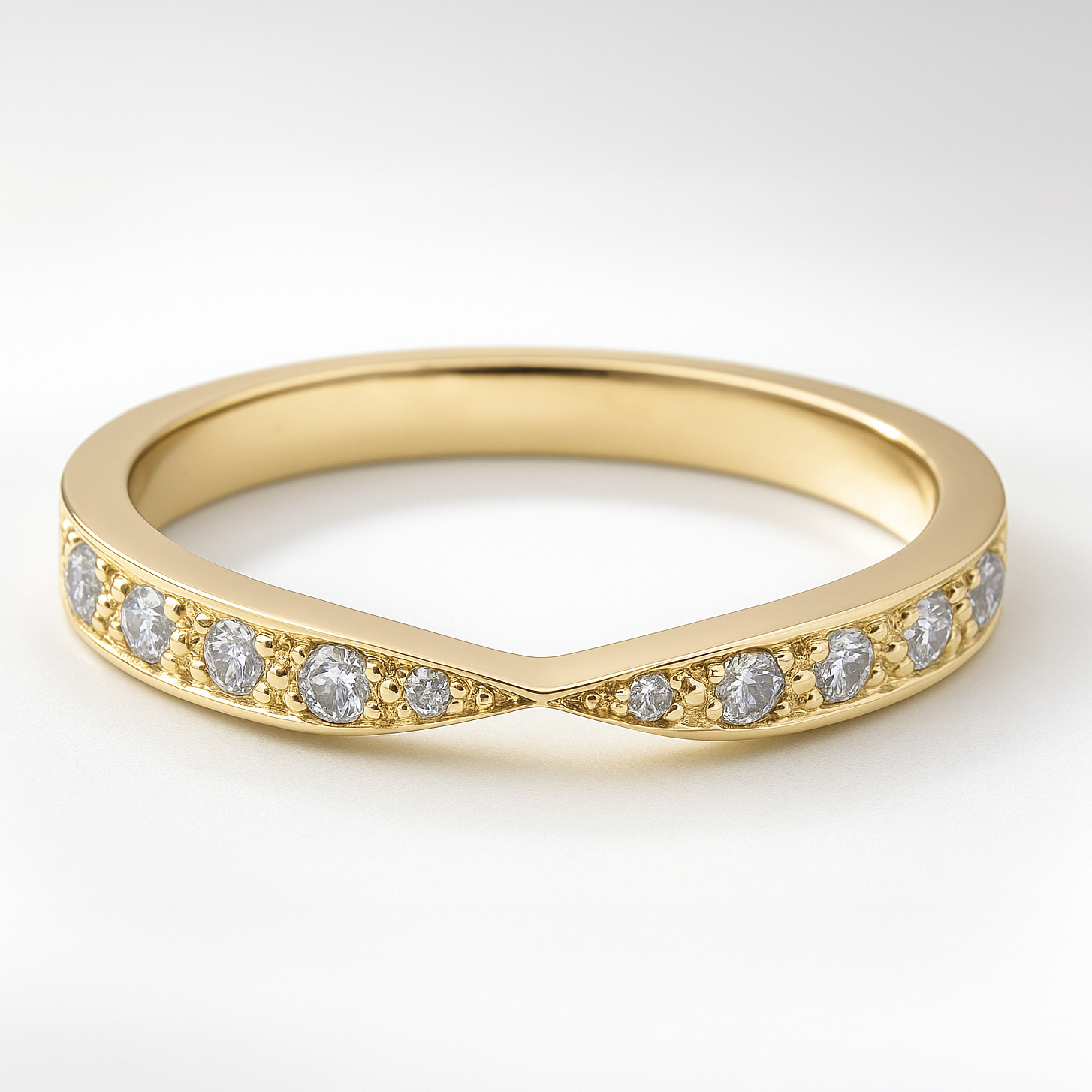 Yellow Gold Twist Shape Diamond Wedding Ring on a White Background