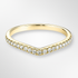 Yellow Gold ring with diamond stones on a light grey background