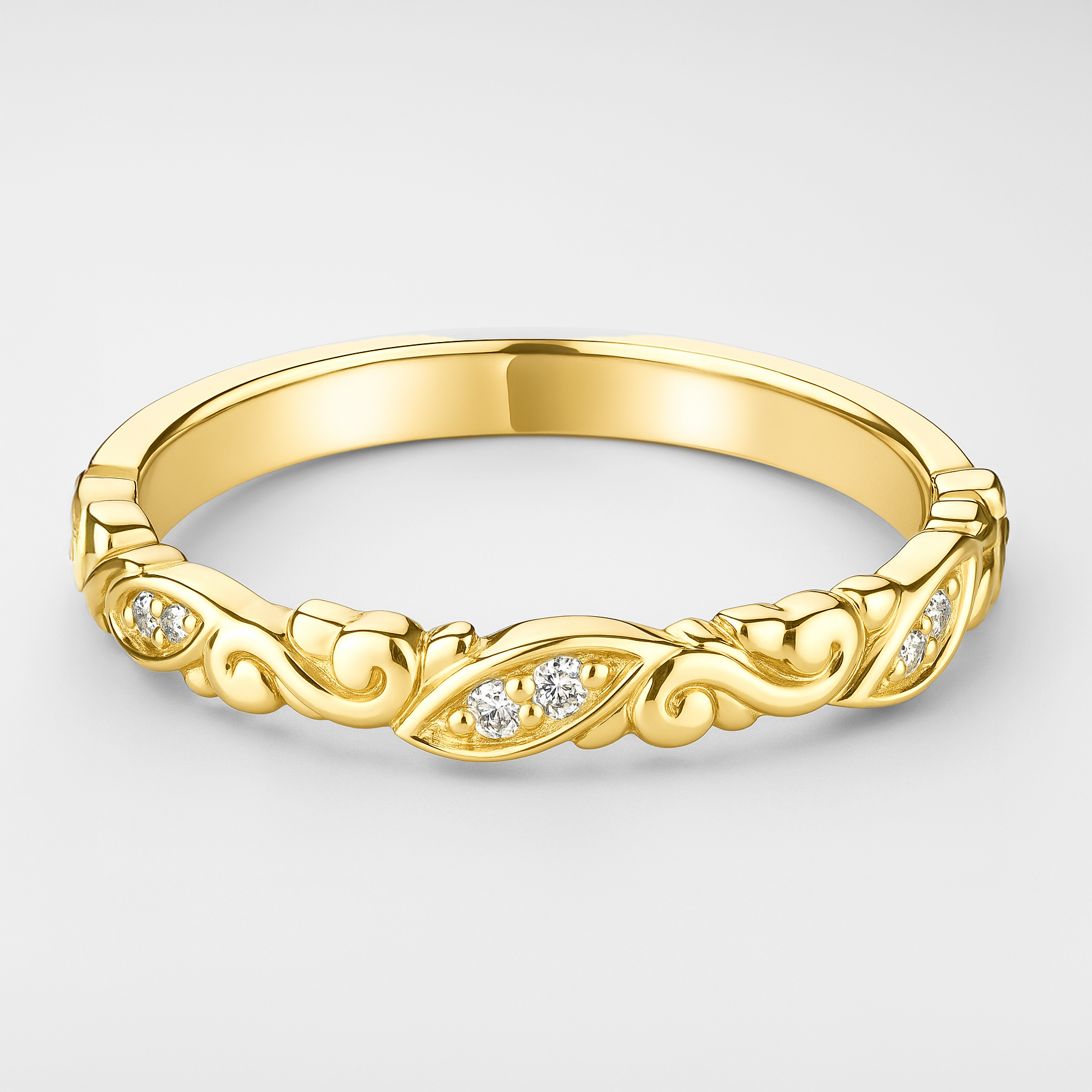 Yellow Gold Scroll Detail Wedding Ring on a White Background