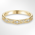 Yellow Gold Geometric Pattern Diamond Wedding Ring on a White Background