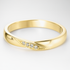 Yellow Gold Wedding Ring with Diamond Accents on a White Background