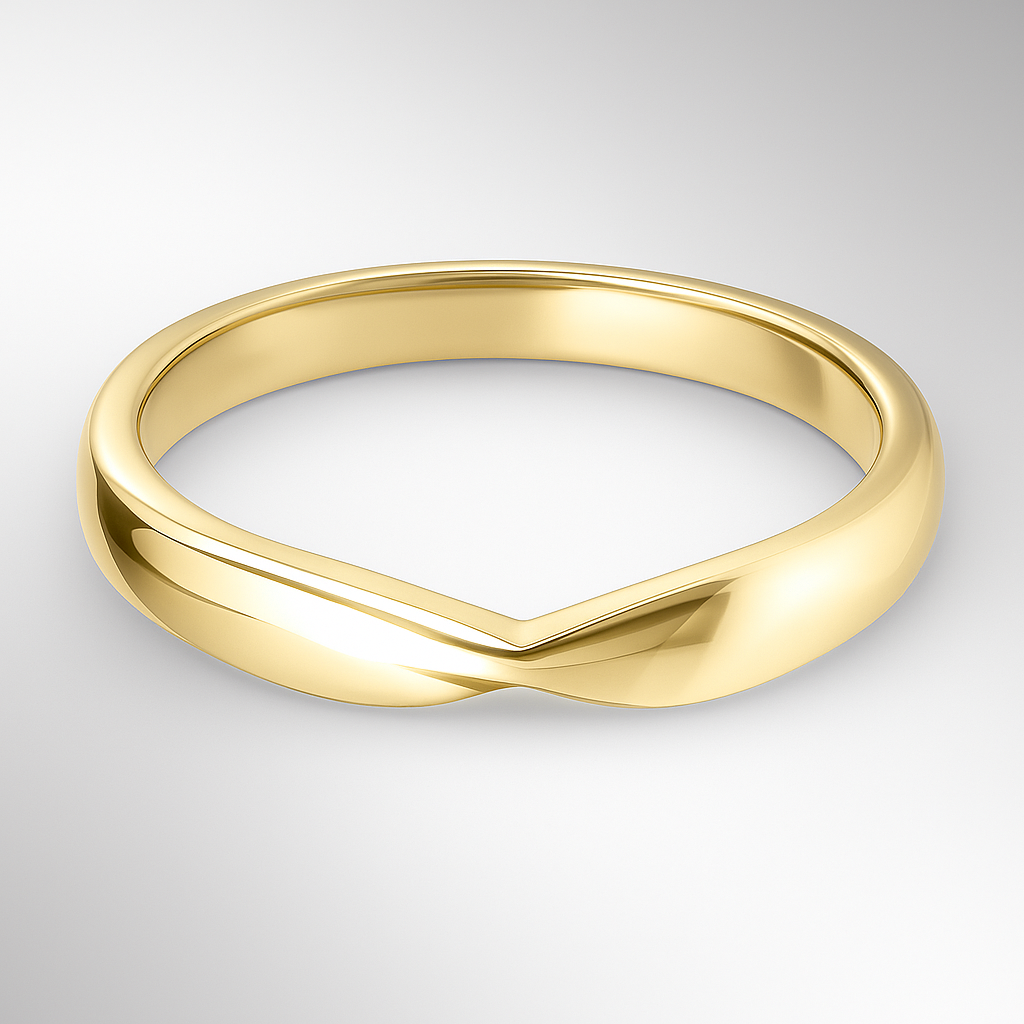 Yellow gold shaped wedding ring on a light grey background